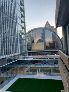 a view of building with yard