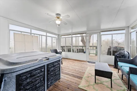 a spacious bedroom with a bed and a table