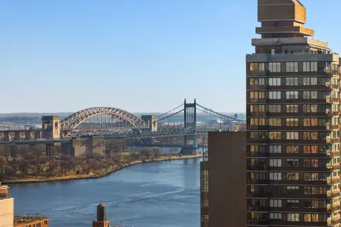 a view of a city with tall buildings