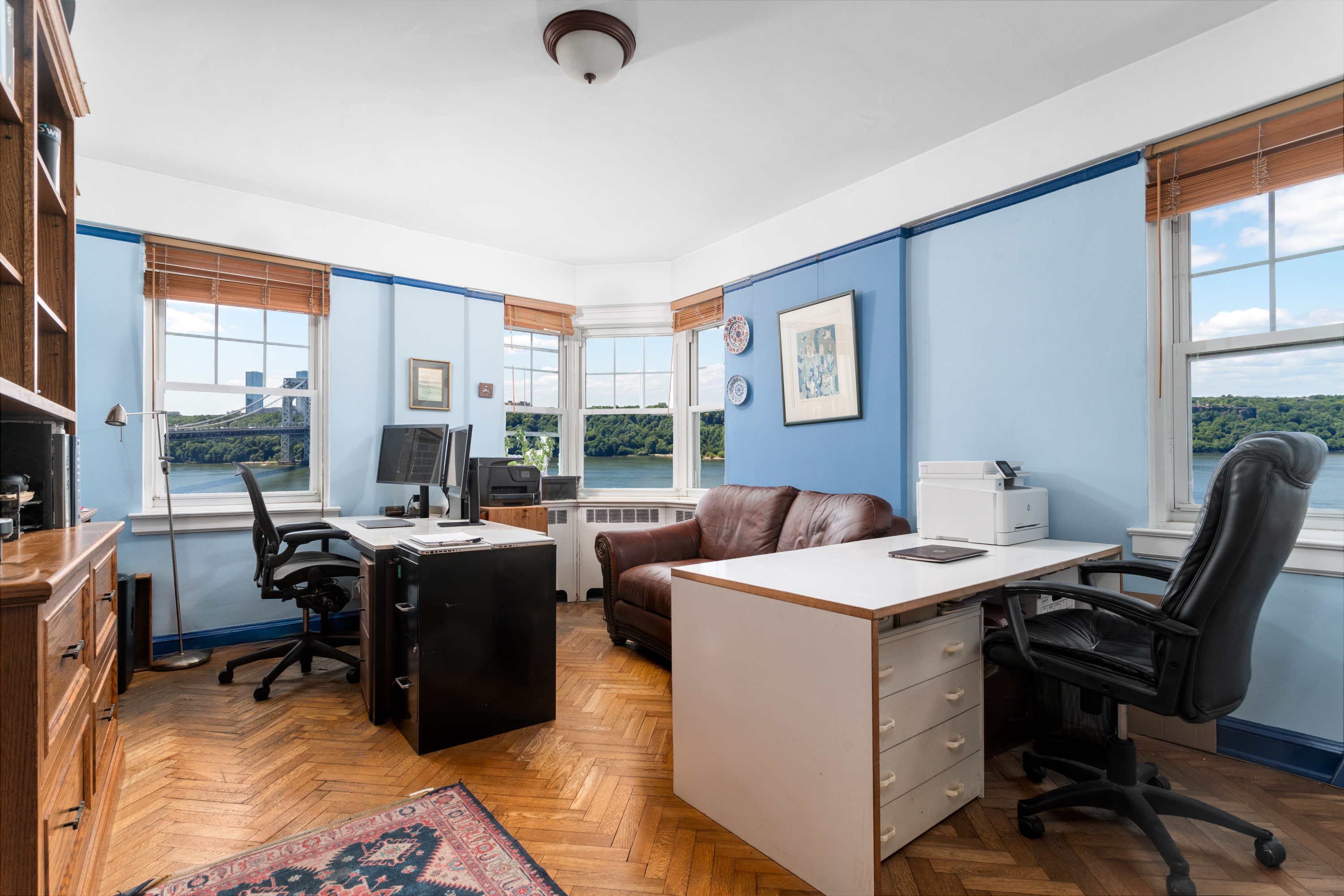 180 Cabrini Boulevard, Unit 61 Manhattan, NY 10033 - Photo 8 of 33 a view of a workspace with furniture and a window