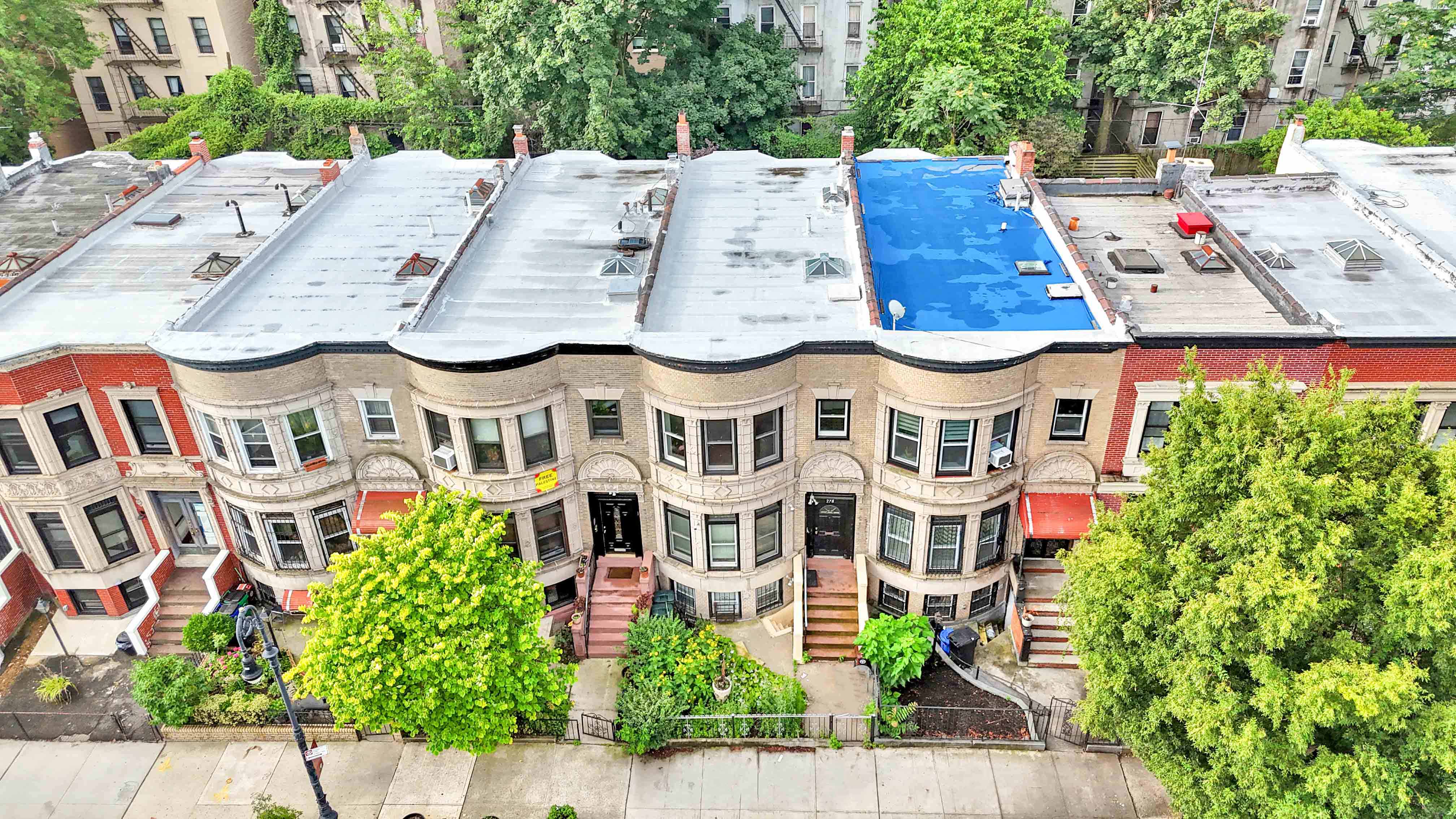 278 Lefferts Avenue Brooklyn, NY 11225 - Photo 54 of 56 an aerial view of residential house with outdoor space and seating space