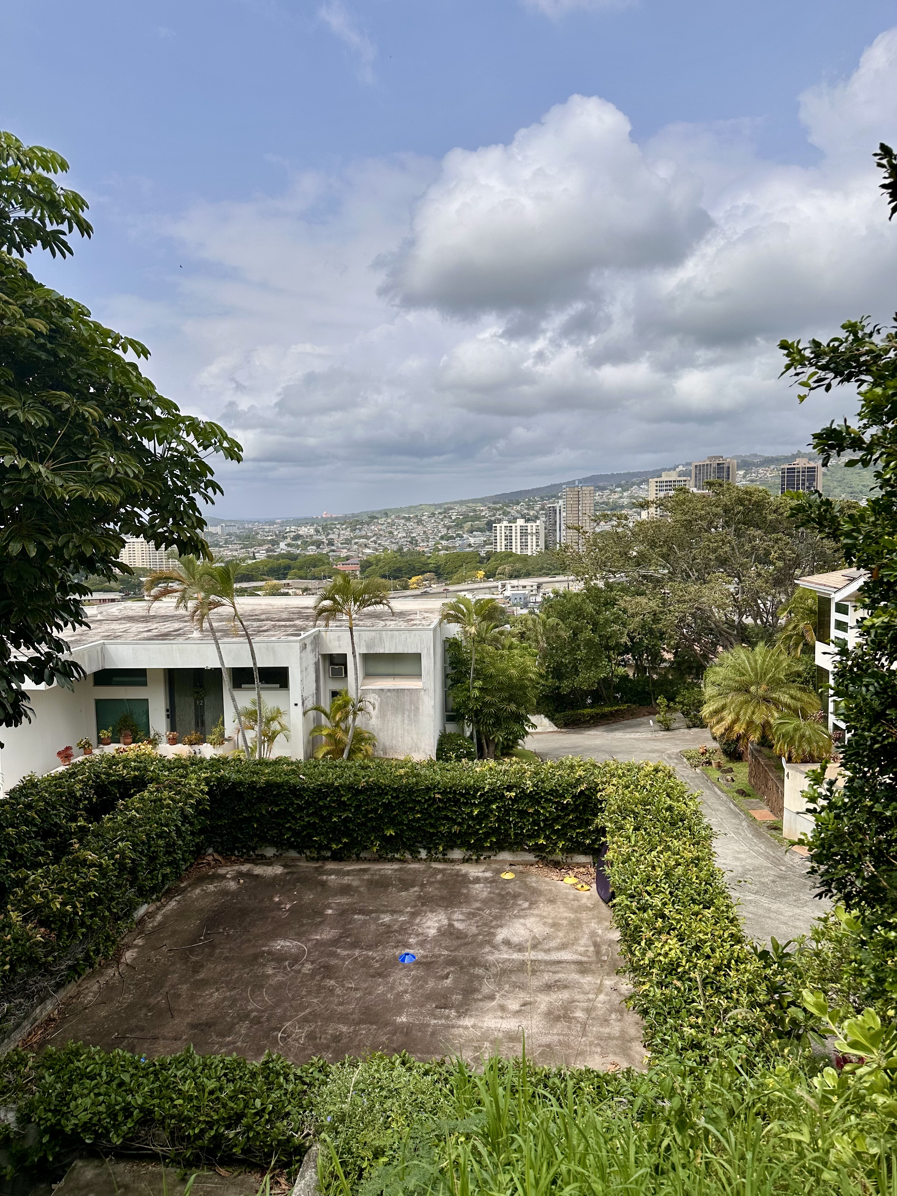 a view of multiple houses with a yard