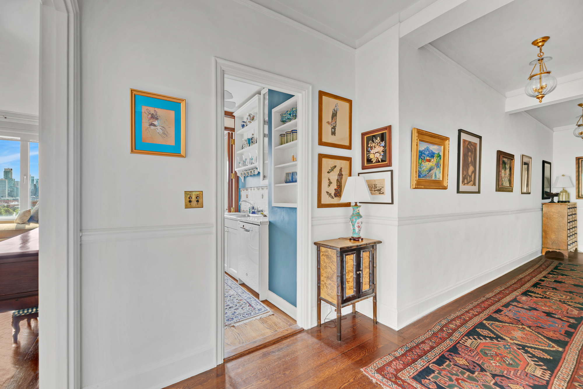 455 East 51st Street, Unit 6B Manhattan, NY 10022 - Photo 10 of 17 a view of an entryway with wooden floor