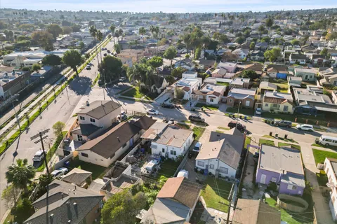 an aerial view of a city with lots of residential buildings