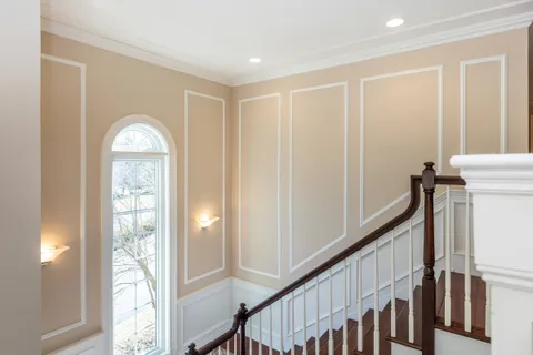 a view of an entryway with a staircase