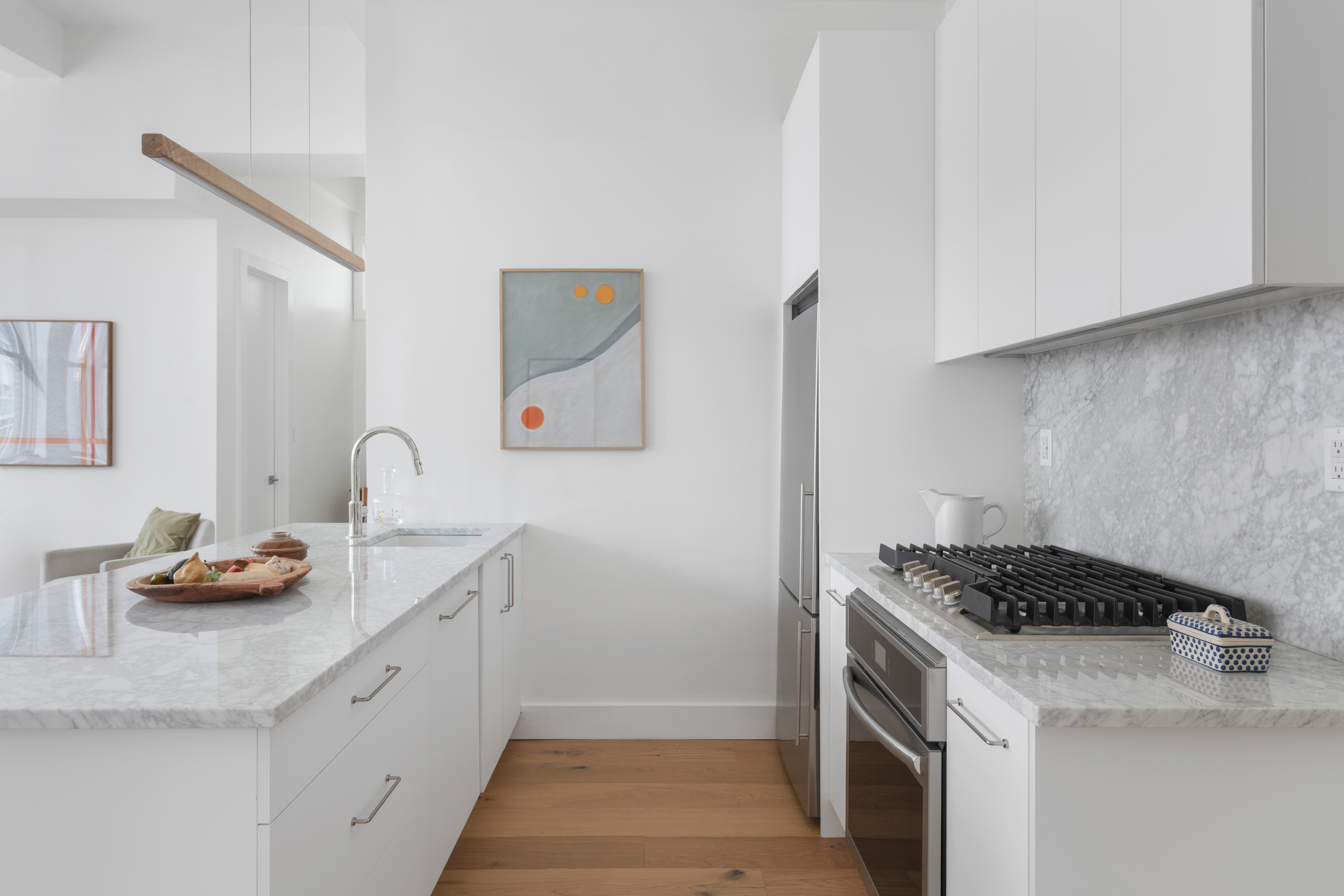 96 Schermerhorn Street, Unit 11F Brooklyn, NY 11201 - Photo 4 of 13 a kitchen with a sink and cabinets