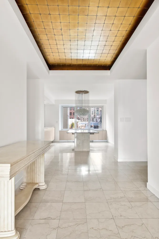 a view of open kitchen with a large window