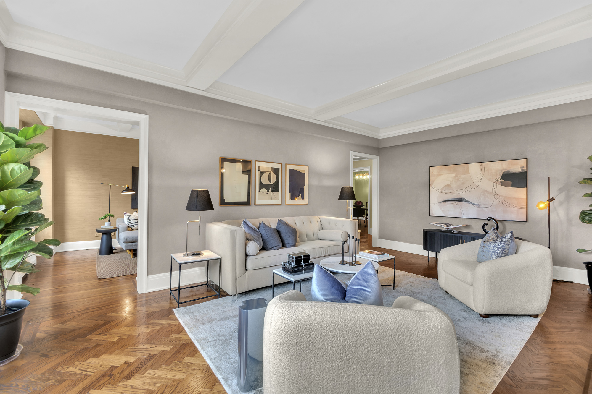 7 Gracie Square, Unit 5A Manhattan, NY 10128 - Photo 4 of 26 a living room with furniture and a flat screen tv