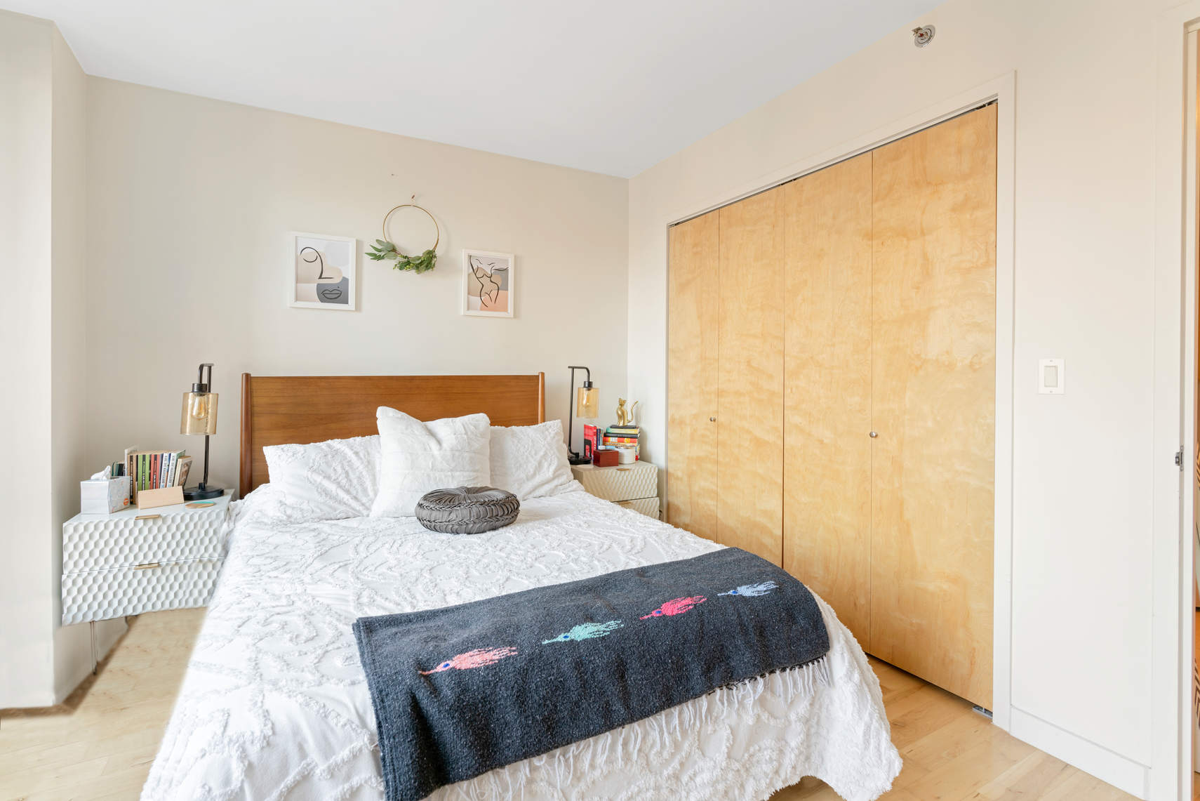 1595 Lexington Avenue, Unit 4H Manhattan, NY 10029 - Photo 5 of 9 a bedroom with a bed and a window