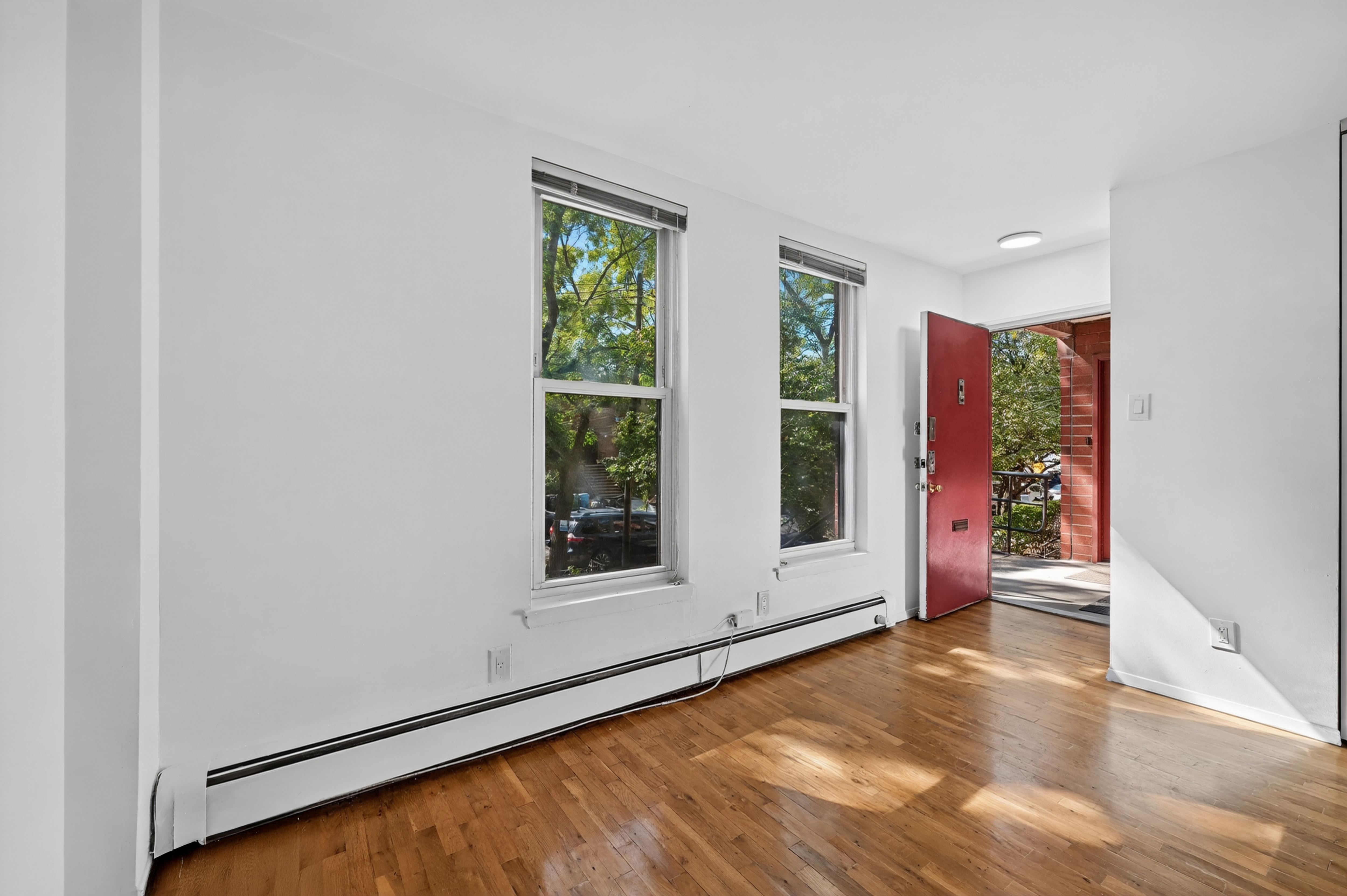 81 President Street, Unit 51-A Brooklyn, NY 11231 - Photo 4 of 27 a view of an empty room with a window