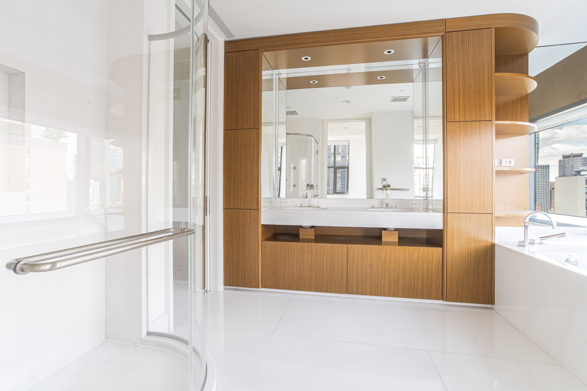 50 United Nations Plaza, Unit 26B Manhattan, NY 10017 - Photo 17 of 25 a view of a living room with a large window