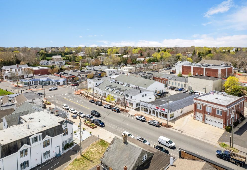 a room with lots of furniture and white walls