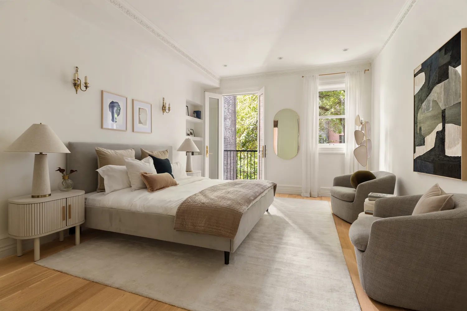 a bedroom with a bed couch and window