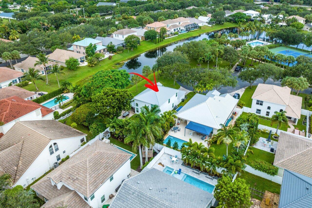 1182 Canoe Point Delray Beach, FL 33444 - Photo 36 of 46 an aerial view of residential house with outdoor space and trees all around