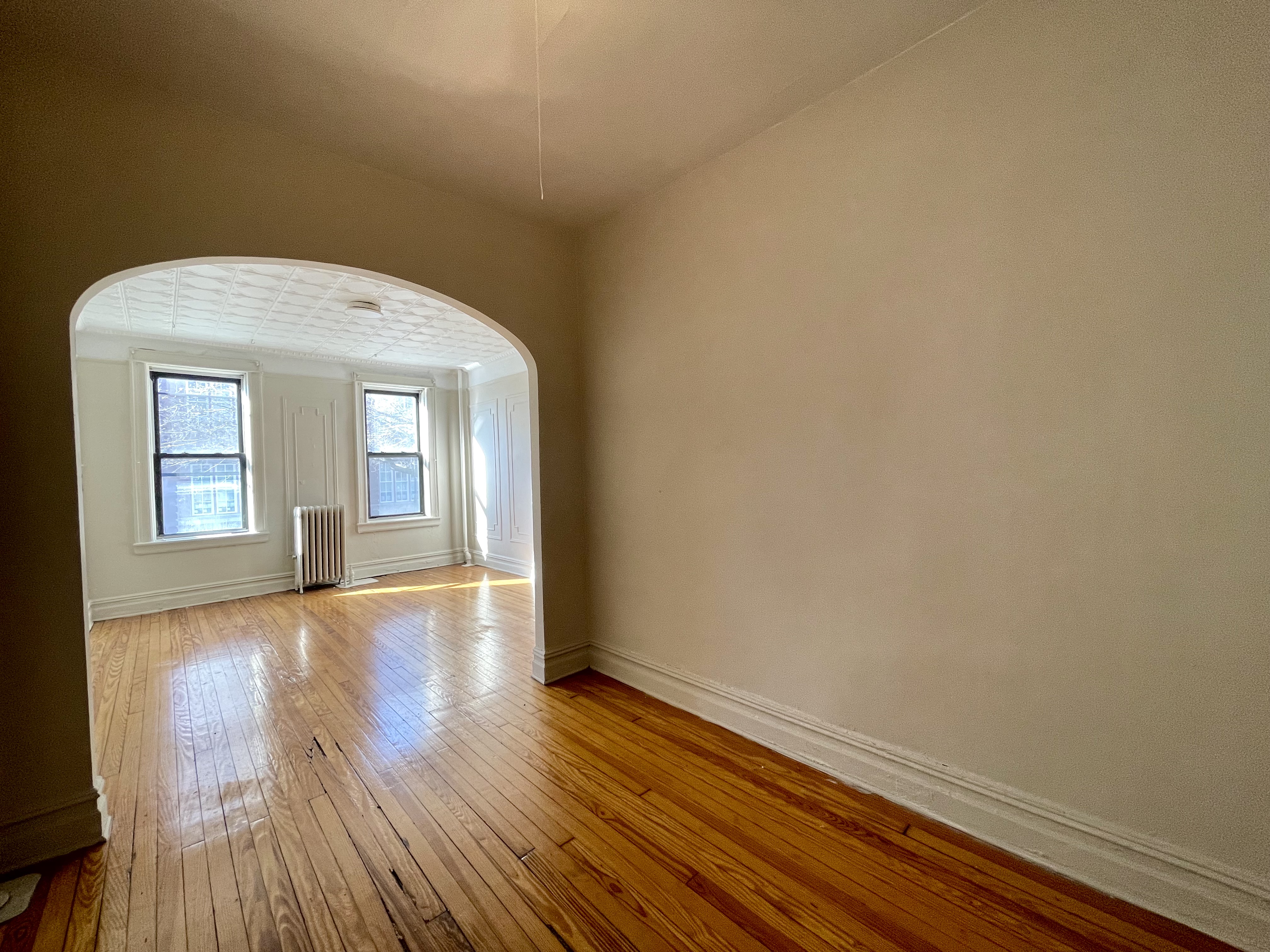 68-43 Fresh Pond Road, Unit 4R Queens, NY 11385 - Photo 2 of 5 a view of livingroom with hardwood