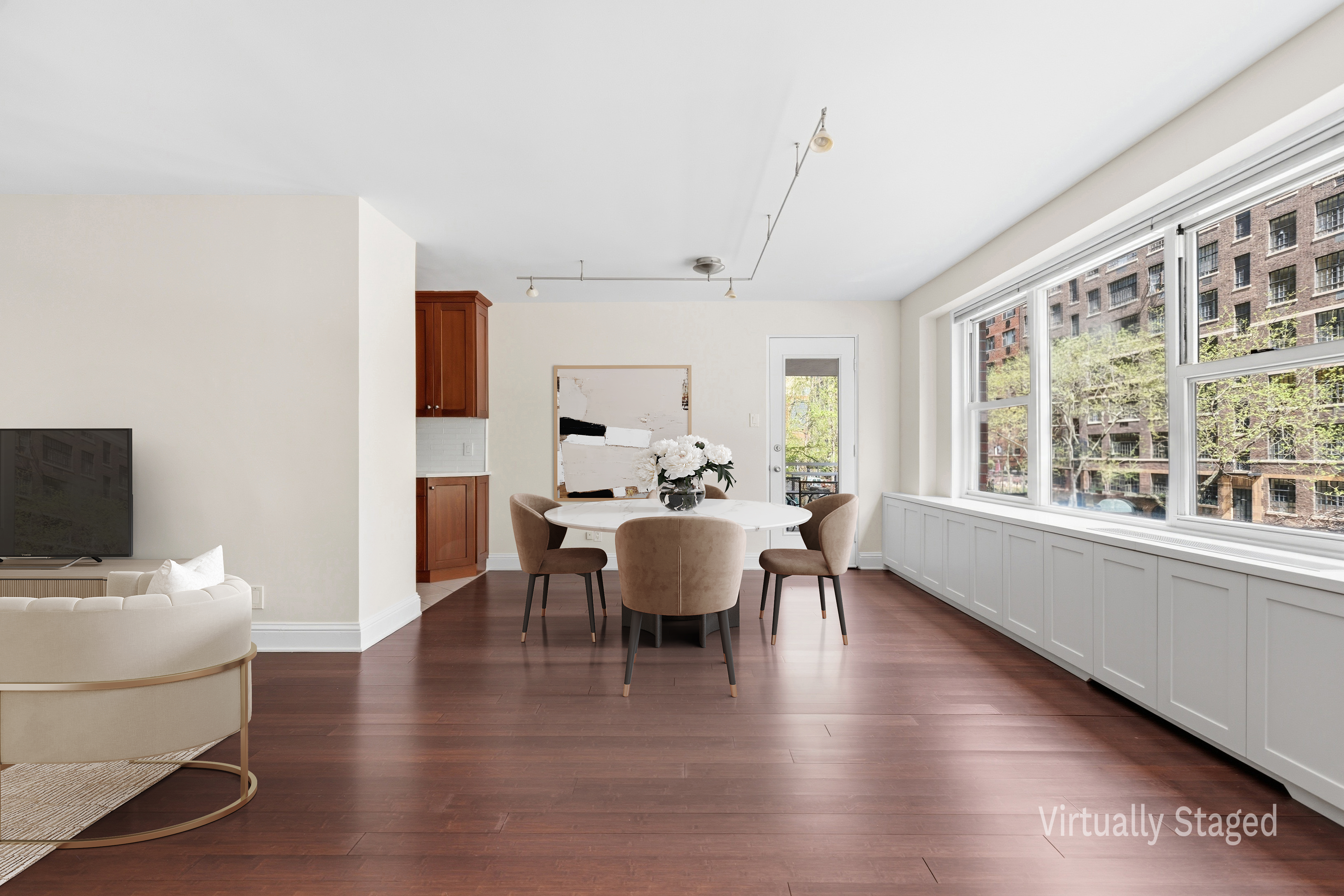 360 East 72nd Street, Unit A306 Manhattan, NY 10021 - Photo 2 of 17 a view of a dining room with furniture window and wooden floor