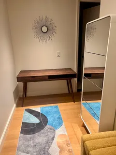 a view of entryway with wooden floor