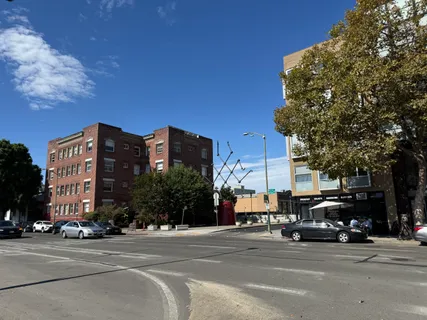 a view of a parked cars in front of a building