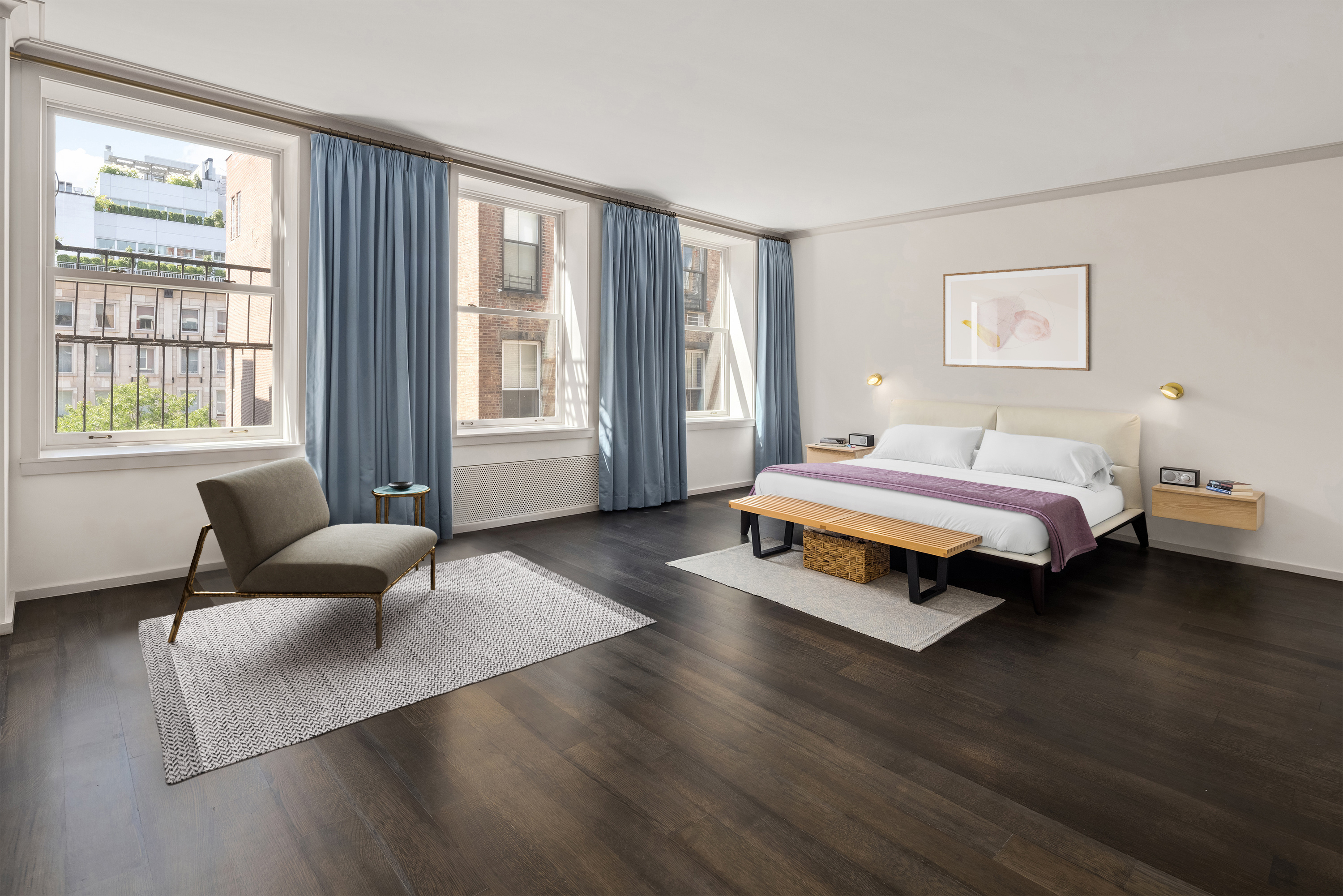 101 Wooster Street, Unit 3/4F Manhattan, NY 10012 - Photo 6 of 16 a bedroom with a bed and wooden floor