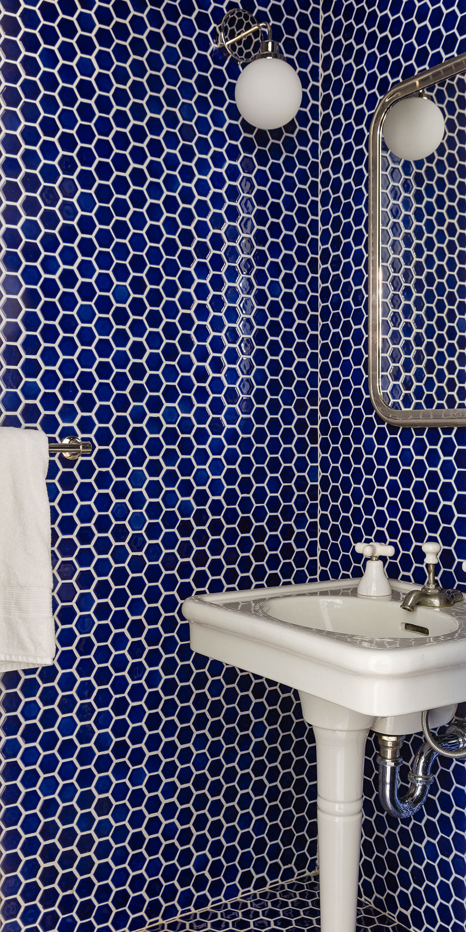 37 Harrison Street Manhattan, NY 10013 - Photo 24 of 26 a bathroom with a sink and a mirror