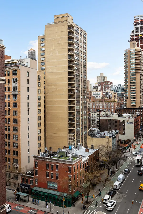 a view of a city with tall buildings
