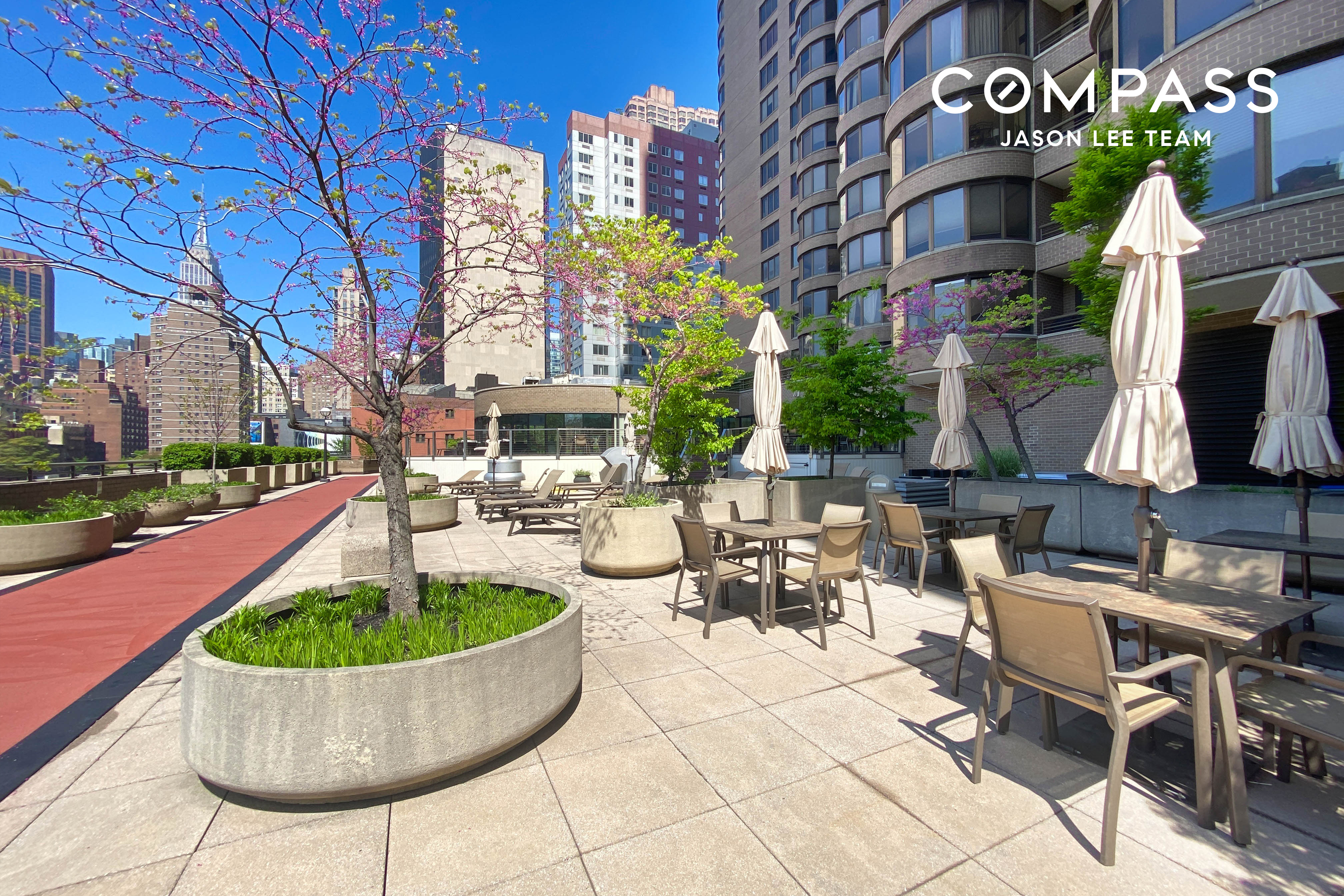 330 East 38th Street, Unit 38E Manhattan, NY 10016 - Photo 32 of 35 a view of a patio with couches table and chairs potted plants