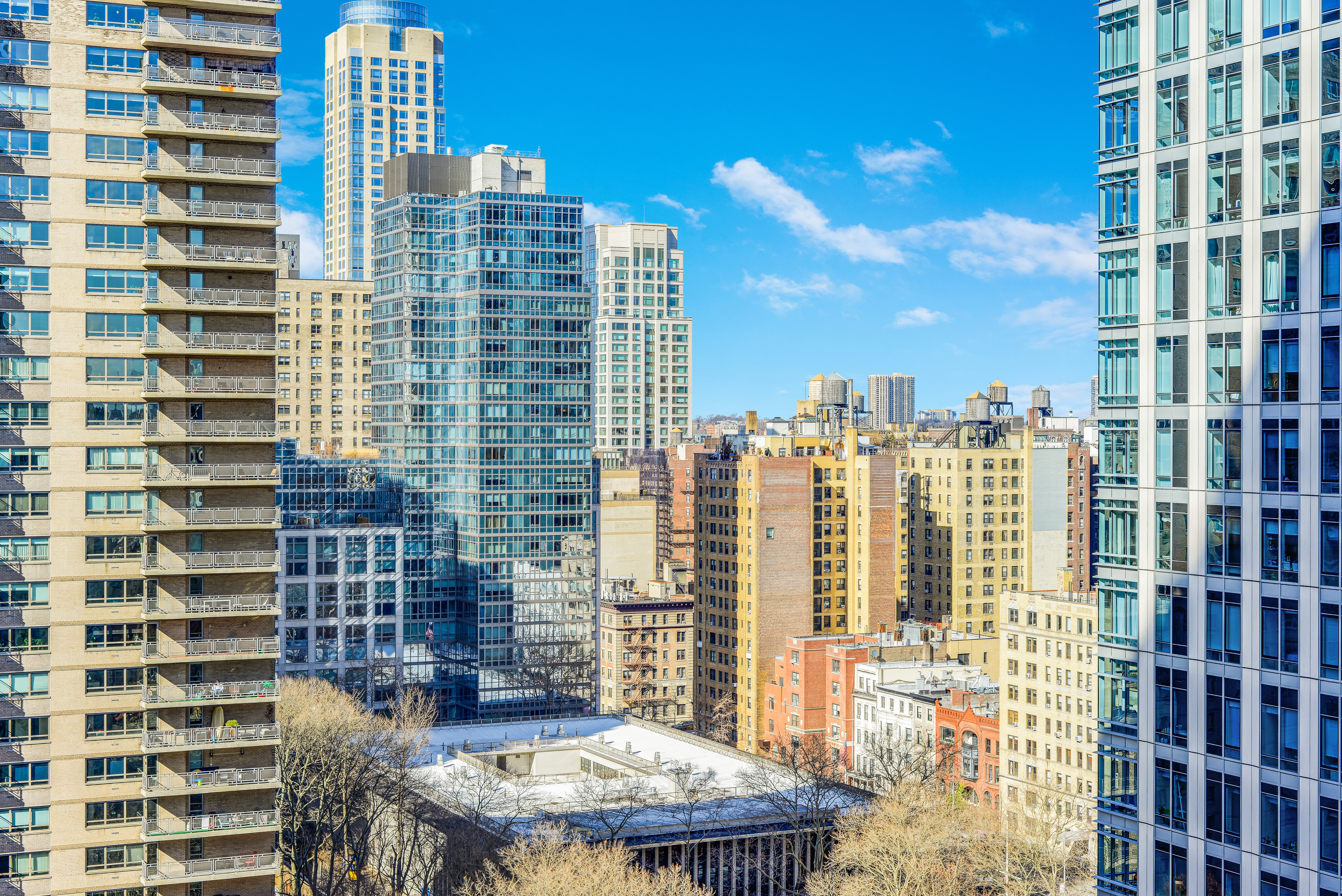 155 West 68th Street, Unit 1907 Manhattan, NY 10023 - Photo 9 of 20 a view of a city with tall buildings