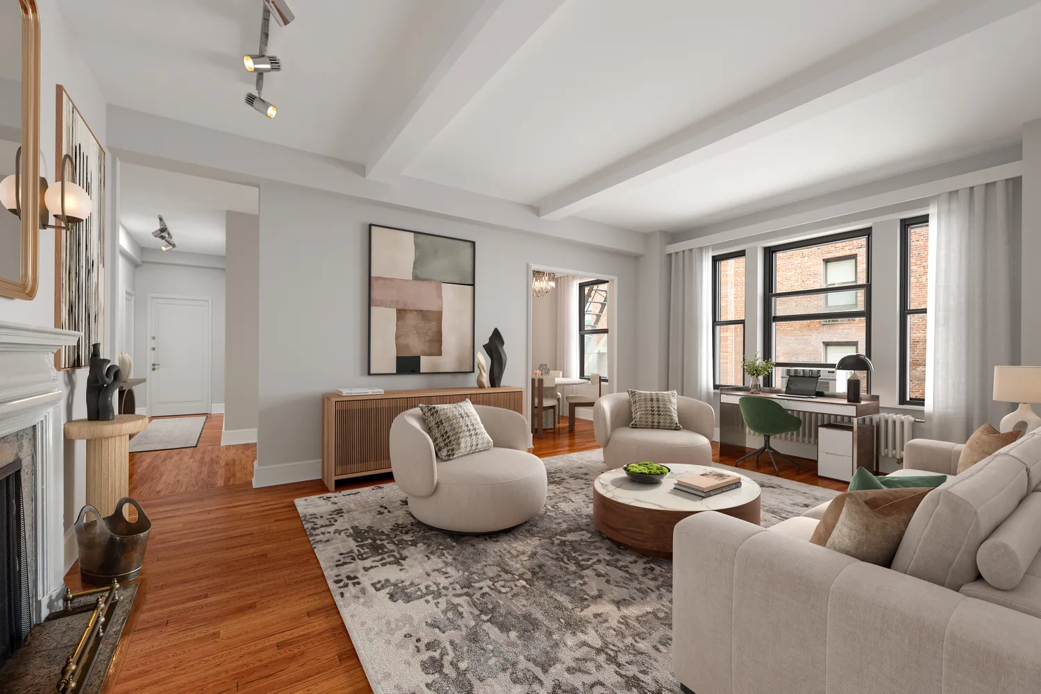 77 Park Avenue, Unit 6G Manhattan, NY 10016 - Photo 1 of 6 a living room with furniture and a fireplace