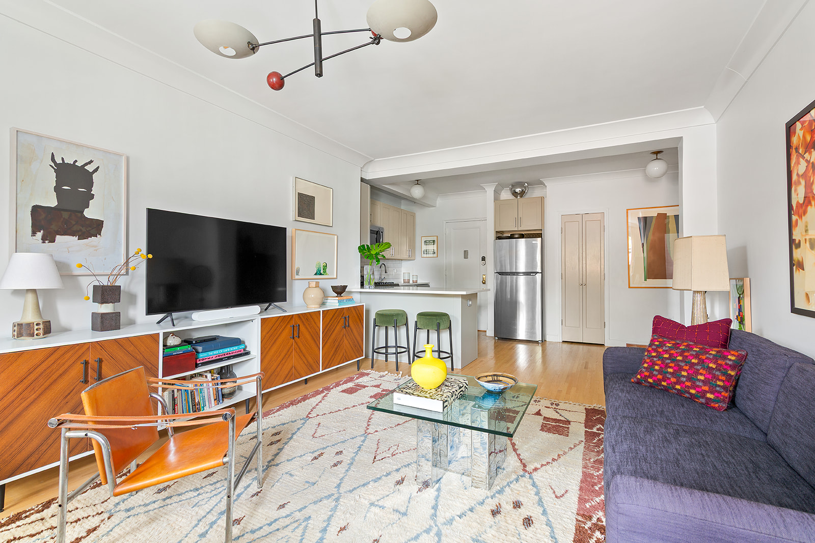 811 Cortelyou Road, Unit 2L Brooklyn, NY 11218 - Photo 2 of 10 a living room with furniture and a flat screen tv