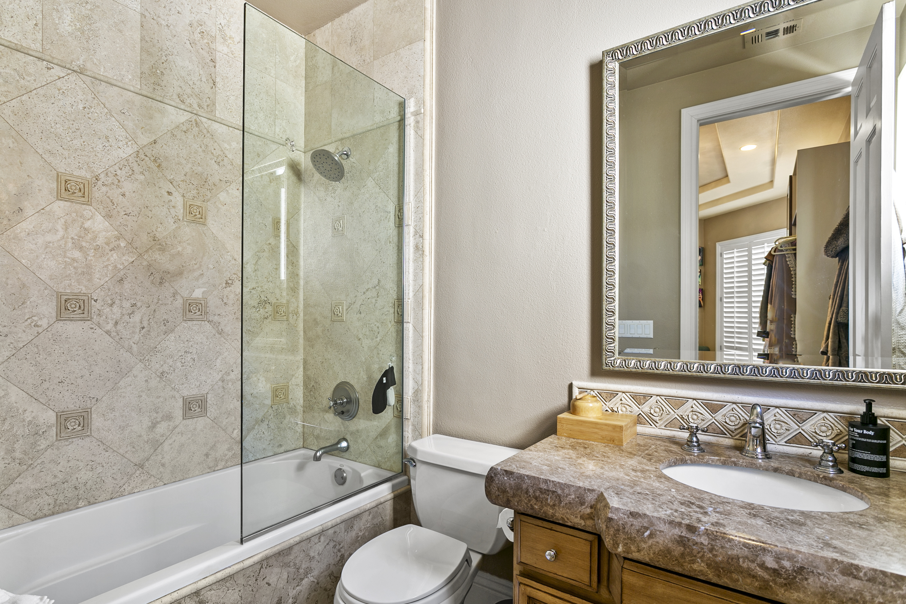 10 Vista Montemar Laguna Niguel, CA 92677 - Photo 43 of 67 a bathroom with a granite countertop tub sink toilet and mirror