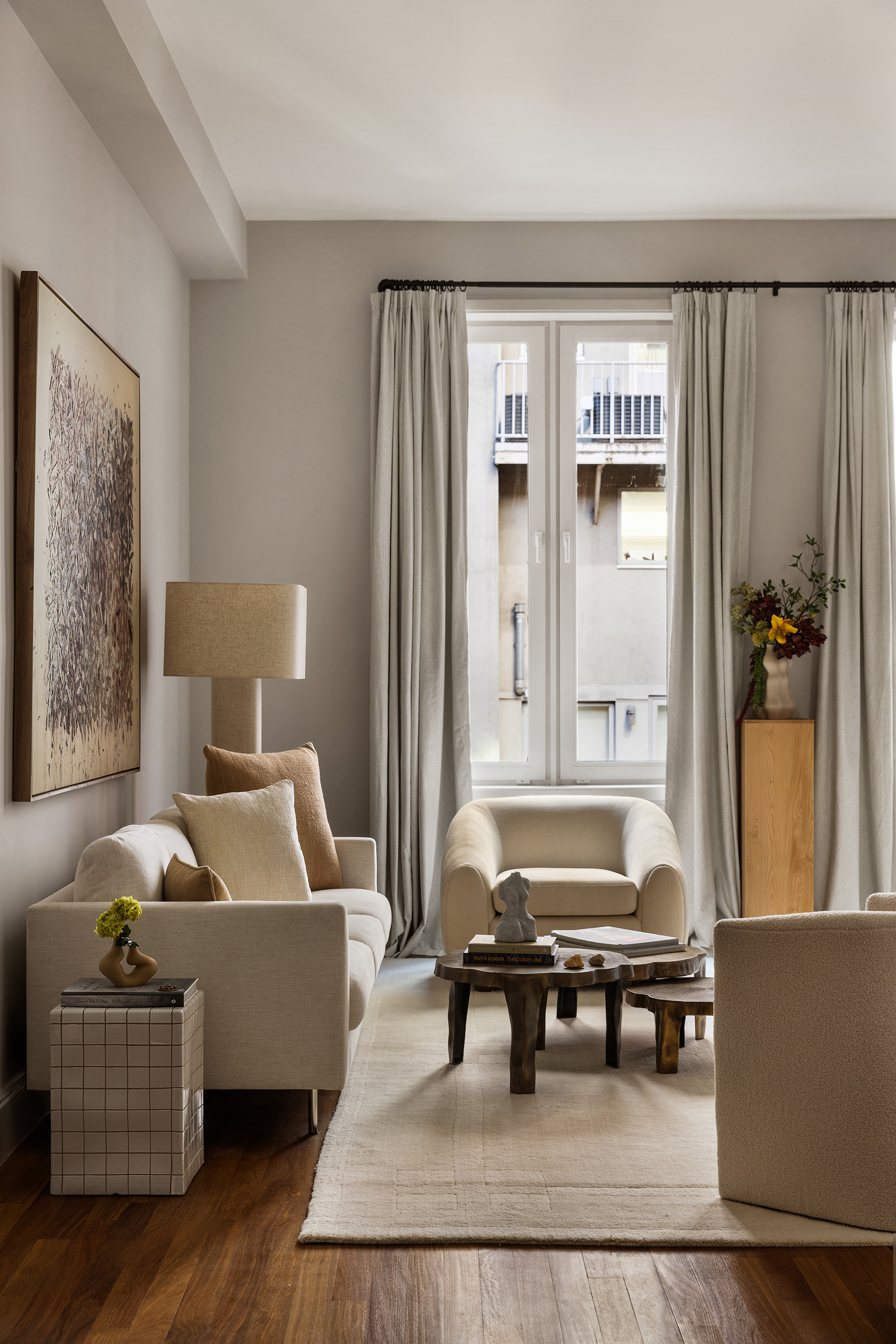 92 Laight Street, Unit 5E Manhattan, NY 10013 - Photo 17 of 26 a living room with furniture and a table