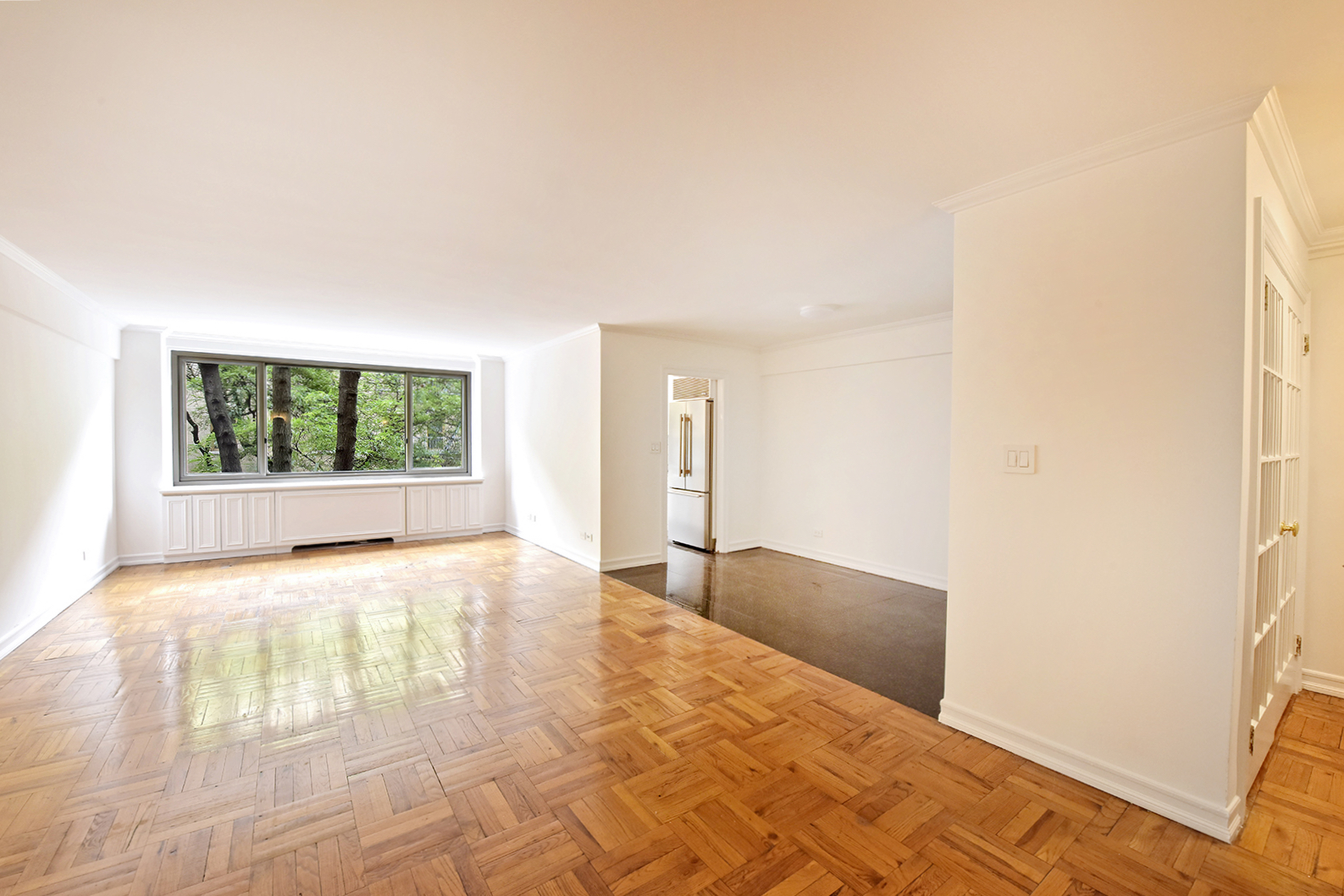 420 East 64th Street, Unit W4D Manhattan, NY 10065 - Photo 2 of 19 a view of an empty room and window
