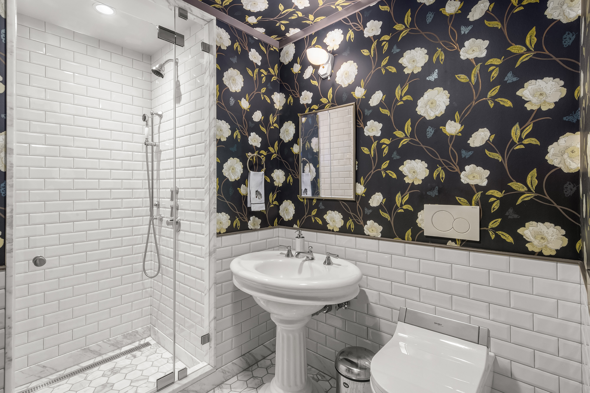 455 West 20th Street, Unit PH Manhattan, NY 10011 - Photo 20 of 21 a bathroom with a sink and mirror