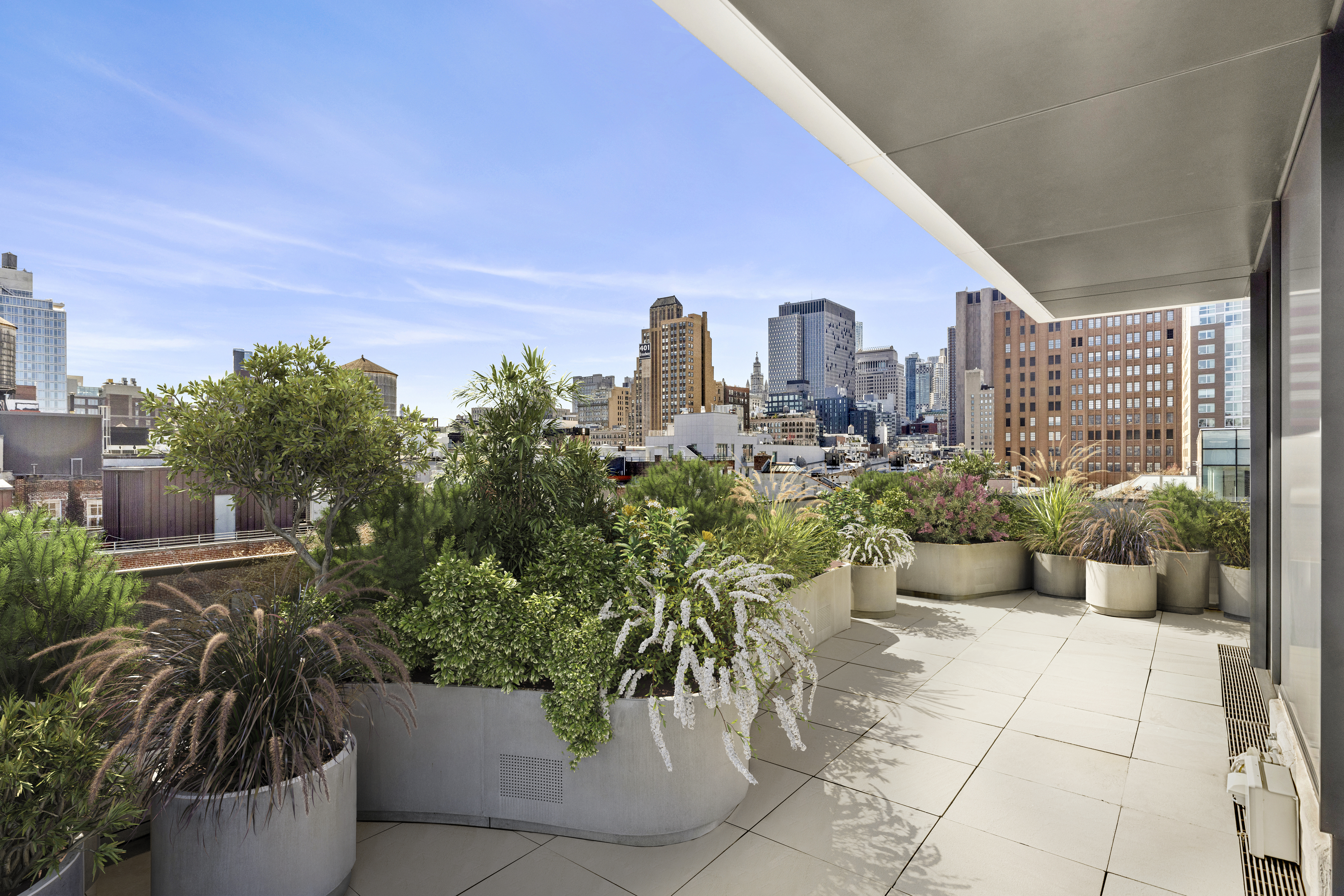 27 Wooster Street, Unit PH Manhattan, NY 10013 - Photo 5 of 34 a view of a terrace with couches and potted plants