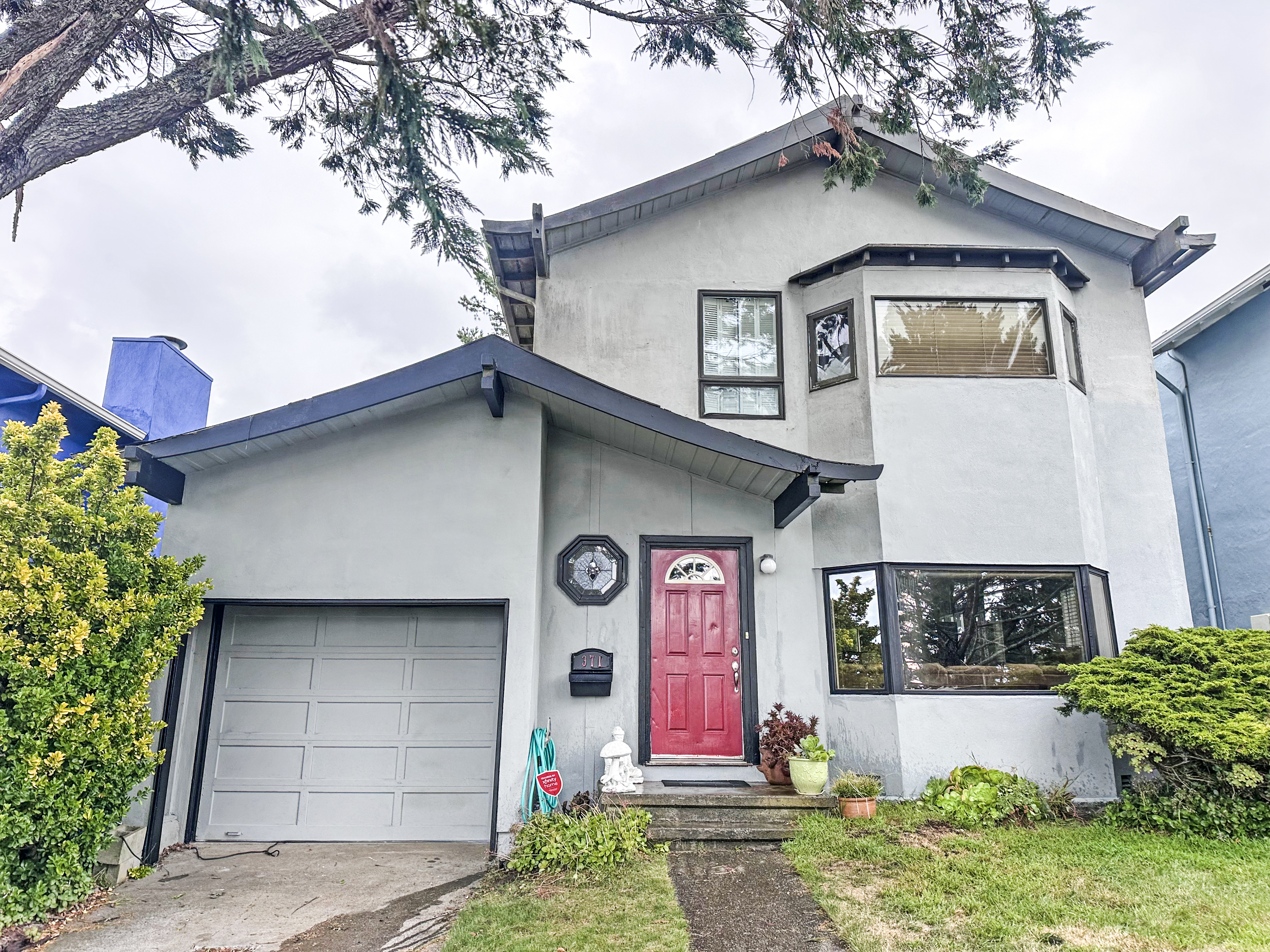 371 Inverness Drive Pacifica, CA 94044 - Photo 1 of 15 a front view of a house with yard