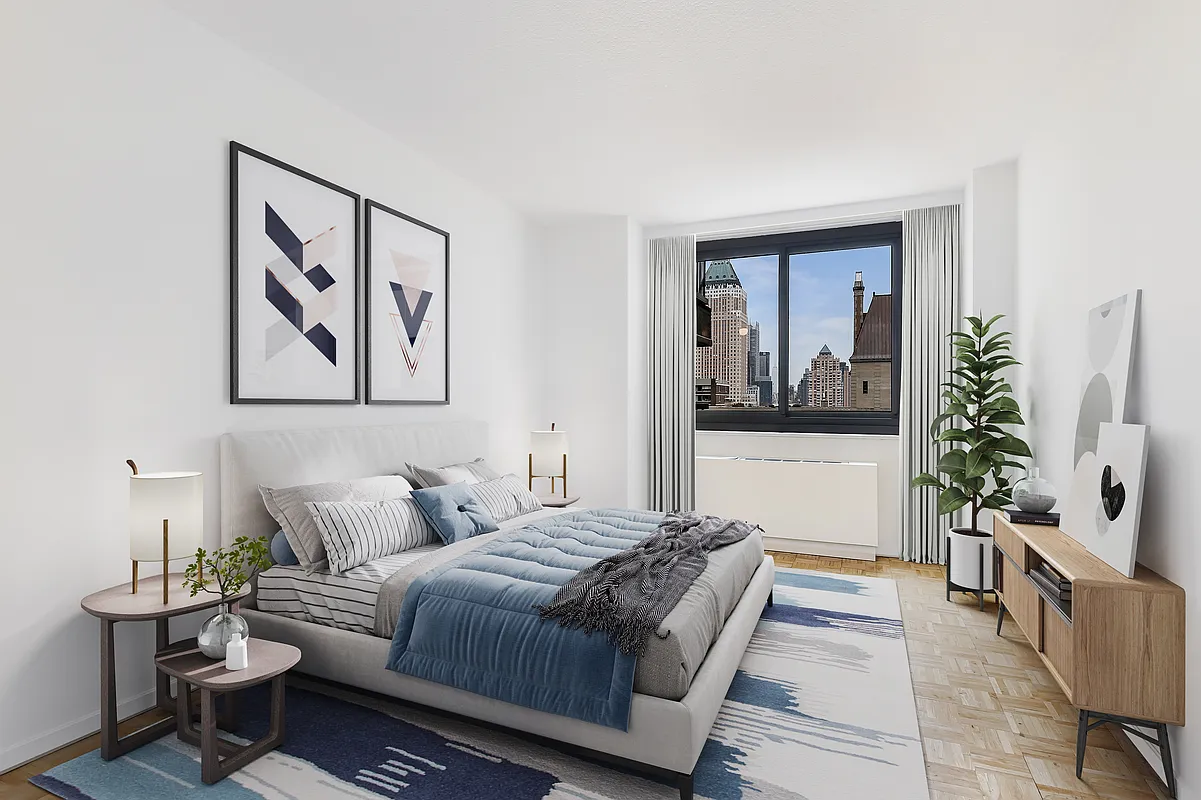 347 West 57th Street, Unit 23A Manhattan, NY 10019 - Photo 3 of 6 a living room with furniture and a potted plant