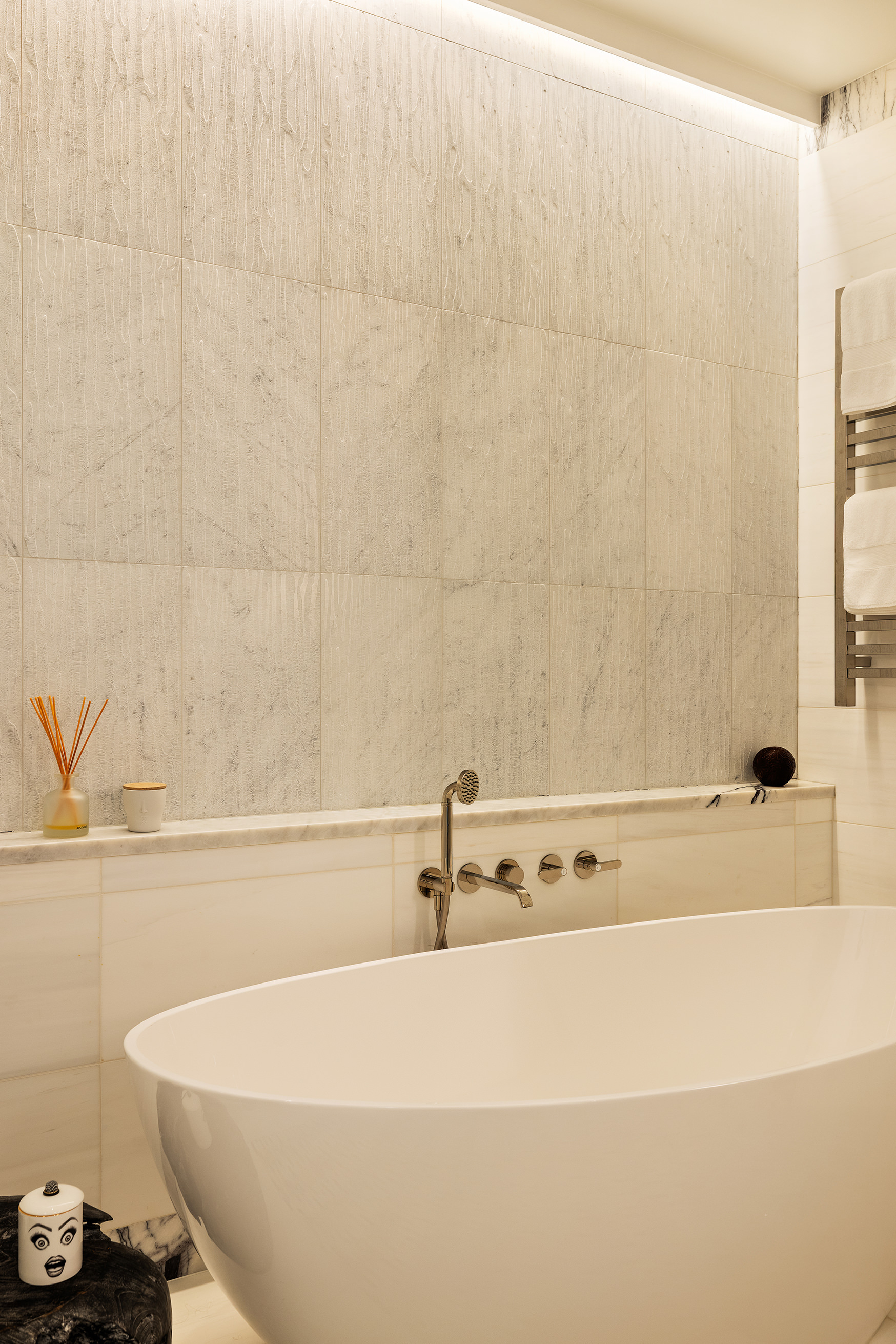 53 Greene Street, Unit 3 Manhattan, NY 10013 - Photo 16 of 22 a bathroom with a bathtub