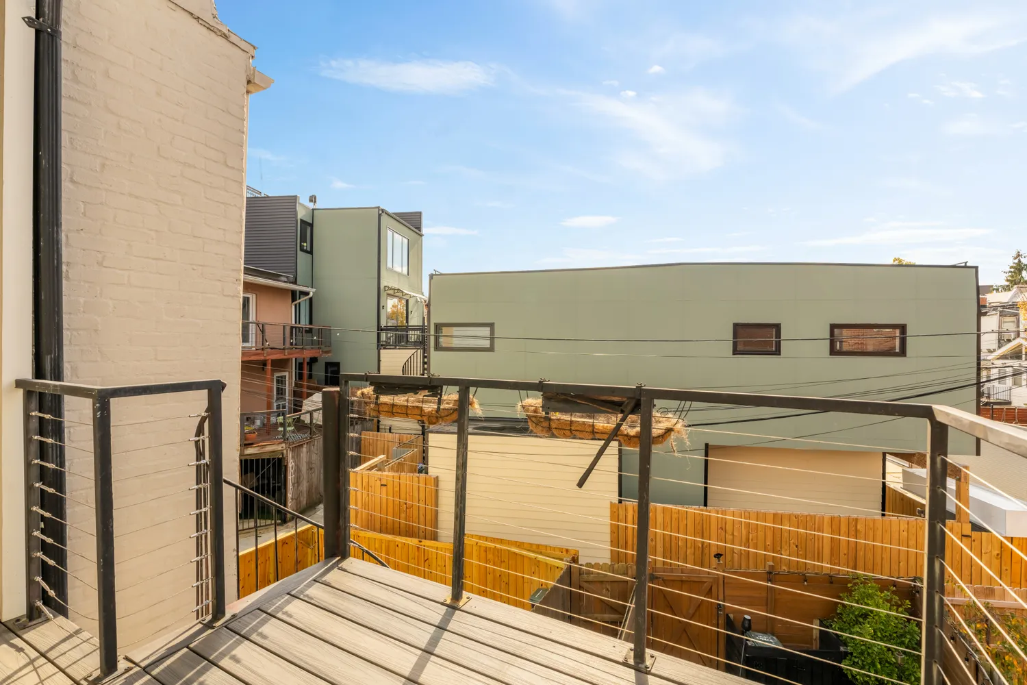 a view of a balcony with chairs