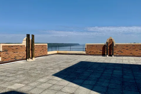 a view of a swimming pool and an outdoor space