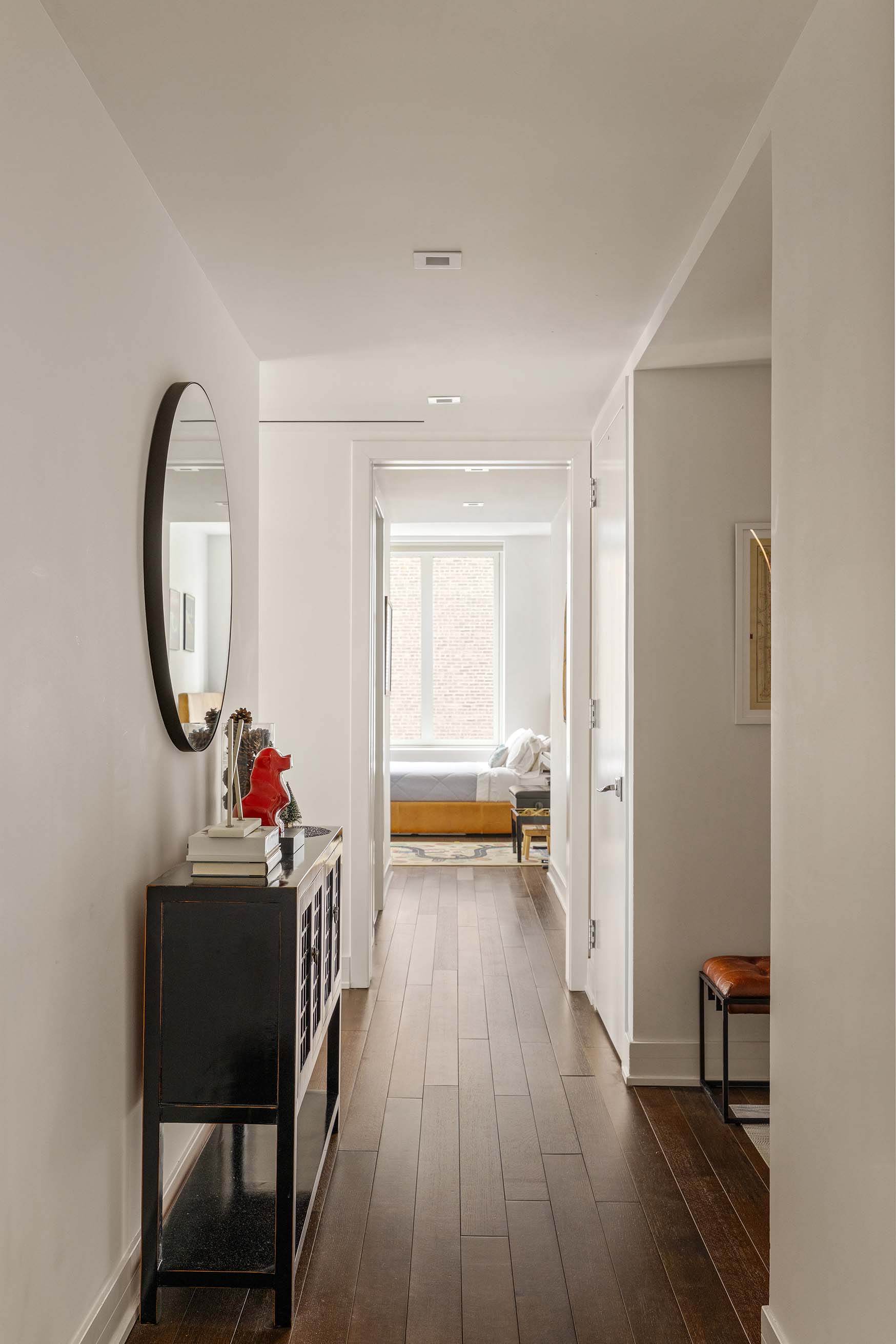 5 Franklin Place, Unit 14A Manhattan, NY 10013 - Photo 14 of 23 a living room with furniture and a wooden floor