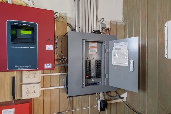 a view of a street with a building in the background