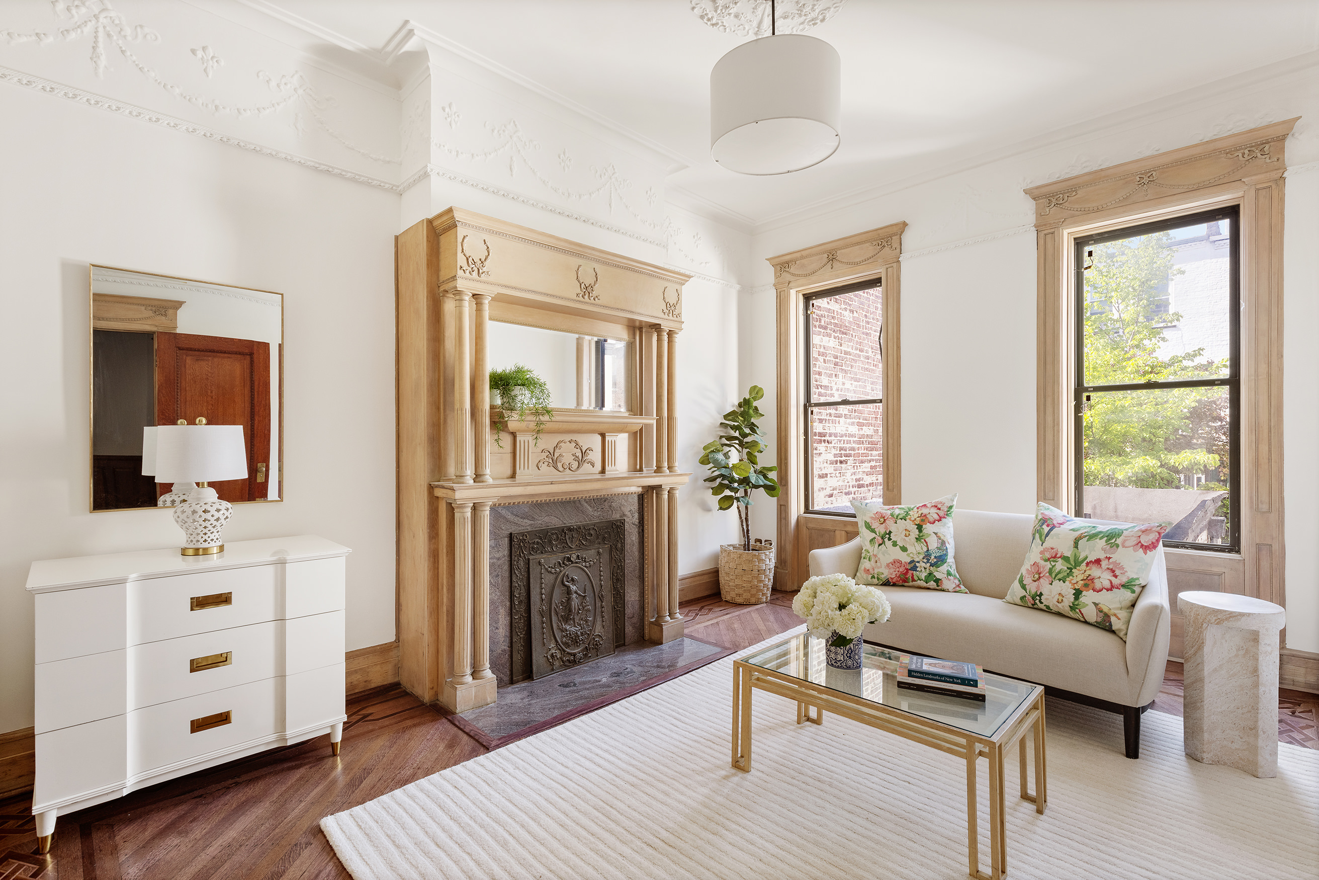 608 2nd Street Brooklyn, NY 11215 - Photo 25 of 34 a living room with furniture and a fireplace