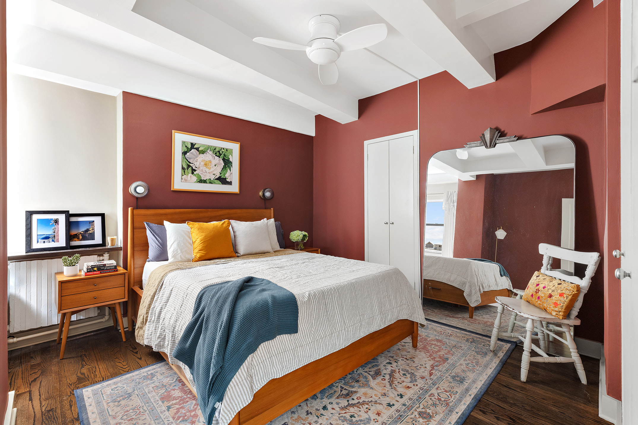 2166 Broadway, Unit 17C Manhattan, NY 10024 - Photo 6 of 11 a bed room with a bed and a chair