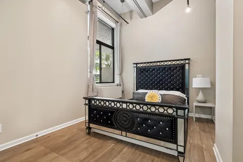 a view of a hardwood & staircase