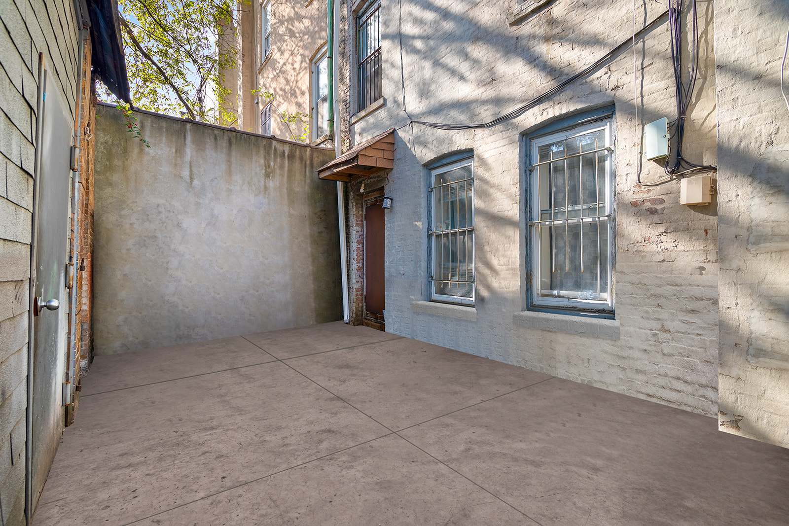 1168 Eastern Parkway Brooklyn, NY 11213 - Photo 6 of 9 a view of backyard of a house