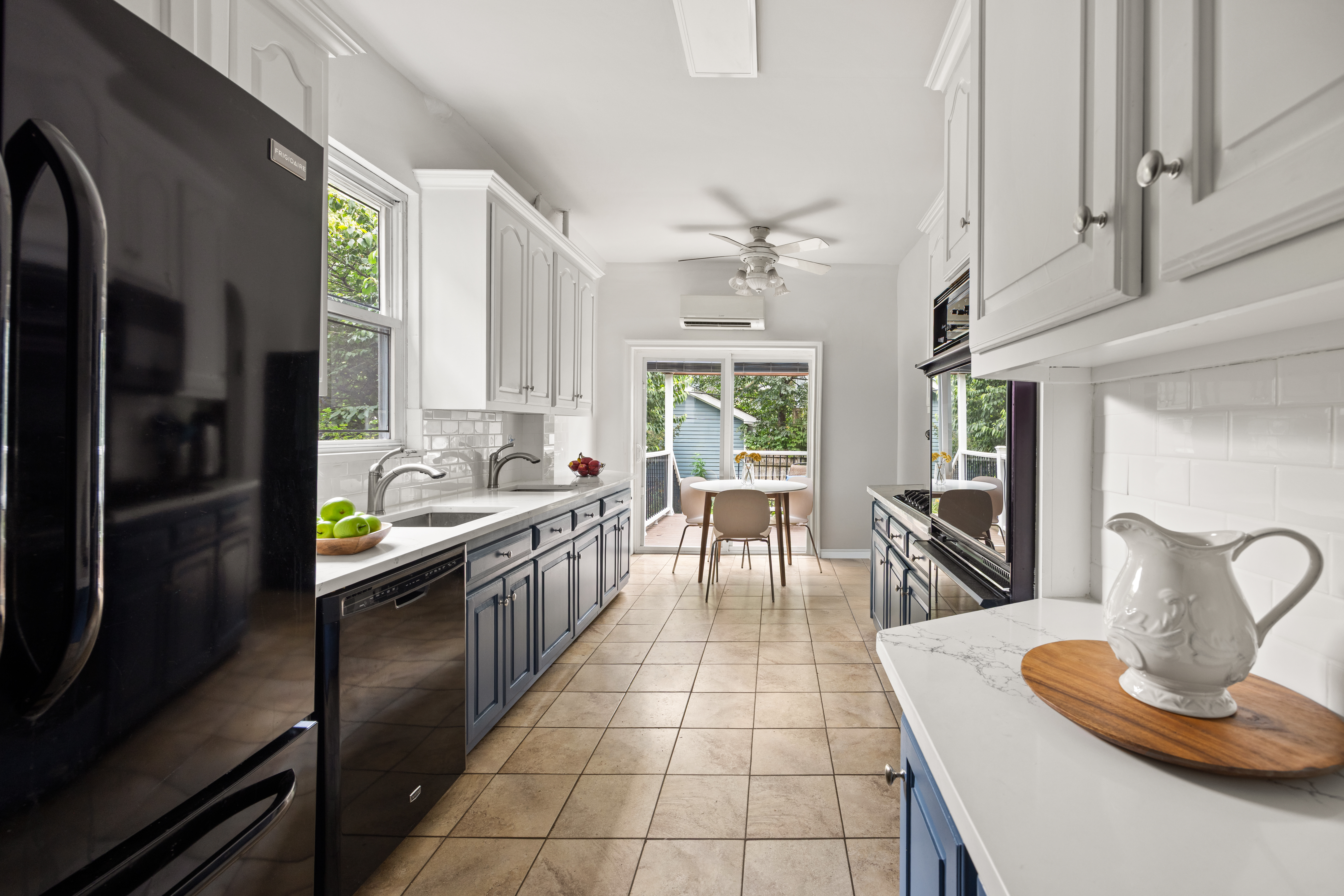 481 Stratford Road Brooklyn, NY 11218 - Photo 8 of 25 a kitchen with stainless steel appliances granite countertop a sink and a refrigerator