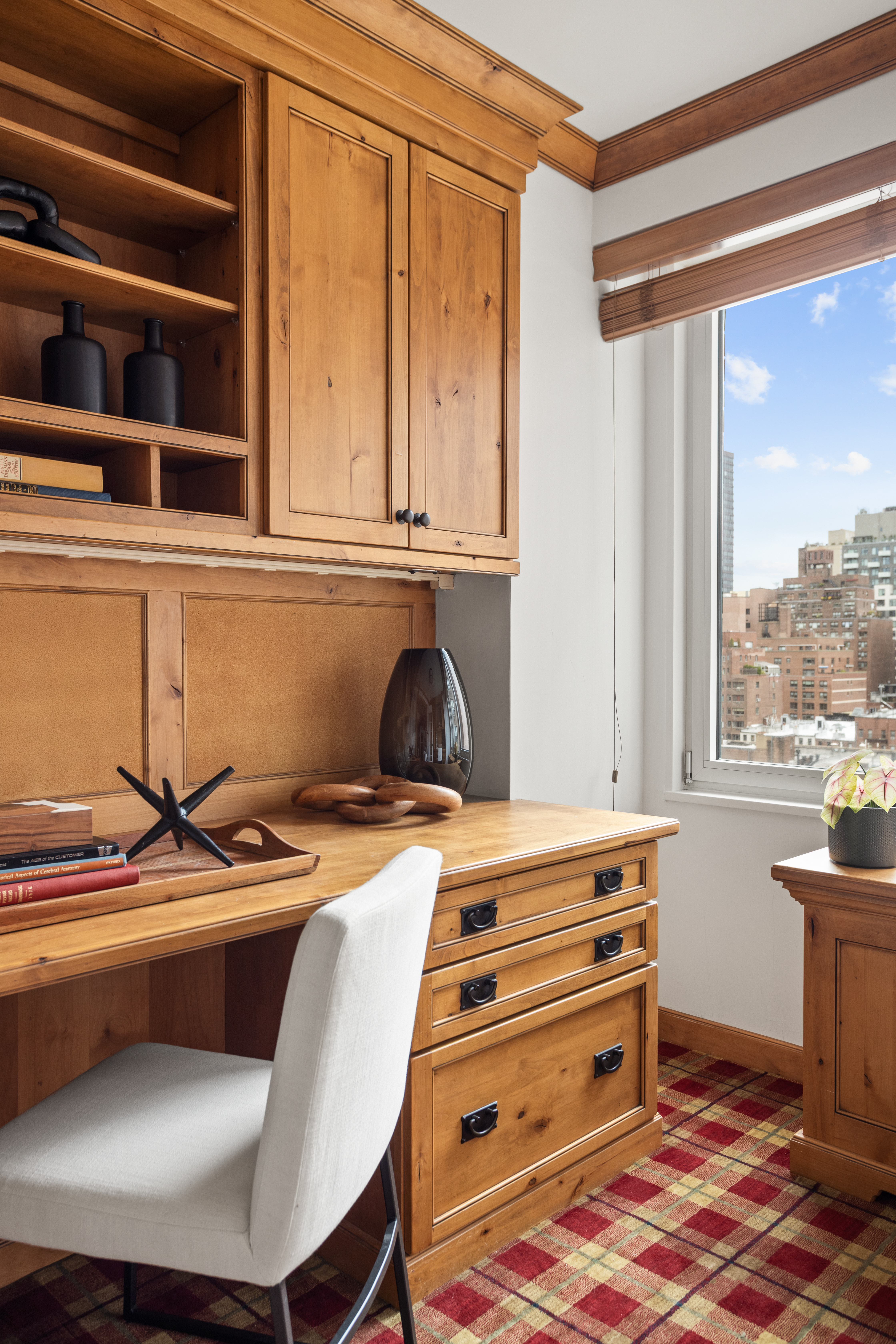 60 East End Avenue, Unit 12C Manhattan, NY 10028 - Photo 17 of 27 a bedroom with a bed and a window
