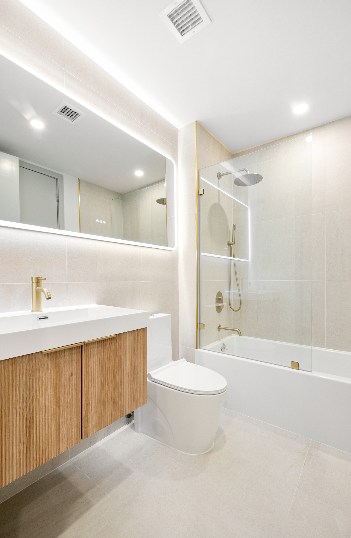 1155 Bedford Avenue, Unit 3F Brooklyn, NY 11216 - Photo 10 of 12 a bathroom with a bathtub a sink and a shower