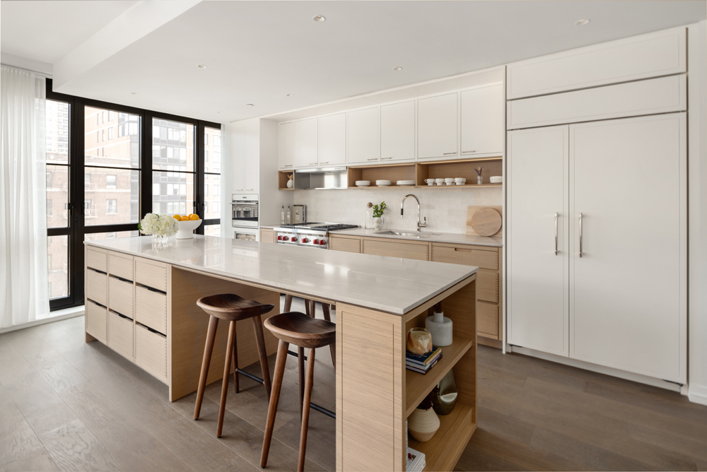 250 West 96th Street, Unit 7D Manhattan, NY 10025 - Photo 4 of 28 a kitchen with a sink a stove and cabinets