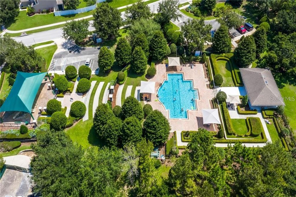 352 Giovani Boulevard Clermont, FL 34715 - Photo 42 of 46 an aerial view of a house with swimming pool and garden